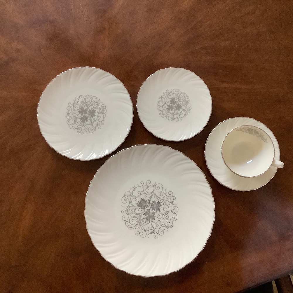 12 place settings of Lenox China
